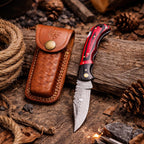 Damascus Steel – Trailing Point Folding Pocket Knife – Red & Black Pakkawood Handle – Brass Hardware & Leather Sheath – Hunting, Camping & EDC - TF-077