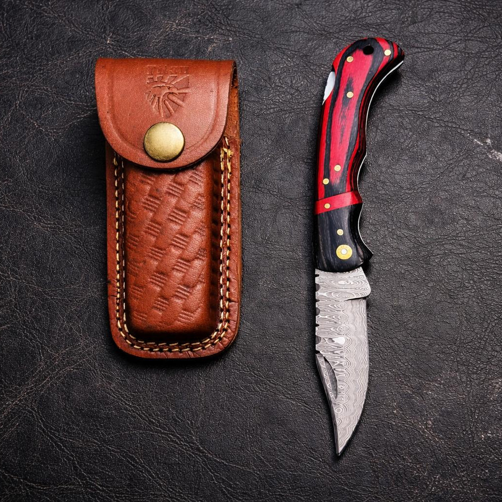 Damascus Steel – Trailing Point Folding Pocket Knife – Red & Black Pakkawood Handle – Brass Hardware & Leather Sheath – Hunting, Camping & EDC - TF-077
